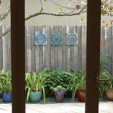 Turquoise handmade tiles with decorative relief. Large decorative tiles handmade in Spain.