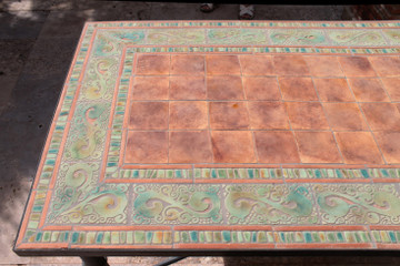 Mosaic table made from Handmade tiles.  Custom designed ceramic table, handmade in Spain.