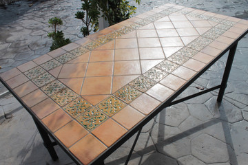 Mosaic table made from Handmade tiles.  Custom designed ceramic table, handmade in Spain.