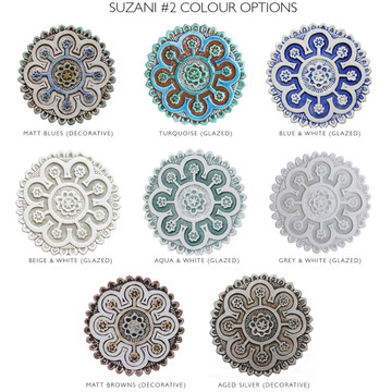 These handmade tiles make a unique wall art installation.  Our decorative tiles make wonderful outdoor wall art, either on a garden column or home entrance. Turquoise circle garden decor handmade in Spain.