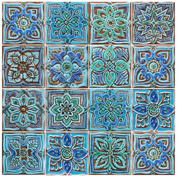 Turquoise handmade tile with decorative relief. Decorative tile handmade in Spain.