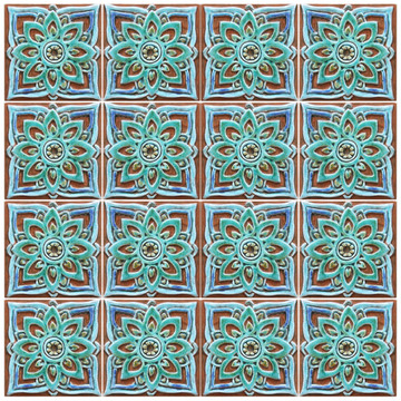 Turquoise handmade tile with decorative relief. Decorative tile handmade in Spain.