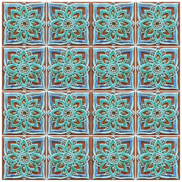 Turquoise handmade tile with decorative relief. Decorative tile handmade in Spain.