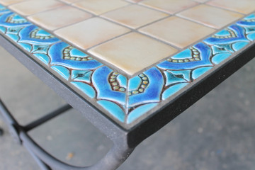 Mosaic table made from Handmade tiles.  Custom designed ceramic table, handmade in Spain.