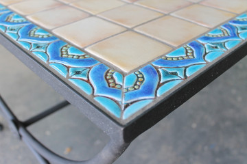 Mosaic table made from Handmade tiles.  Custom designed ceramic table, handmade in Spain.