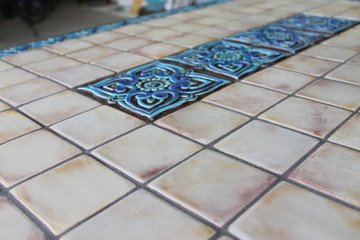 Mosaic table made from Handmade tiles.  Custom designed ceramic table, handmade in Spain.