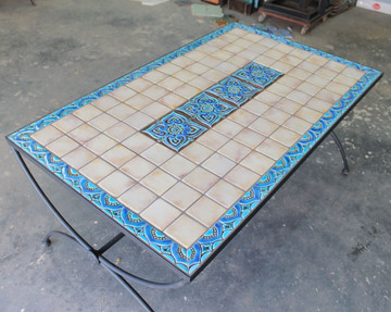 Mosaic table made from Handmade tiles.  Custom designed ceramic table, handmade in Spain.