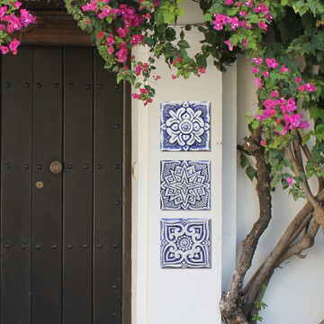 Blue and white handmade tile with relief for kitchens, bathrooms and outdoor wall art. Decorative tile handmade in Spain.