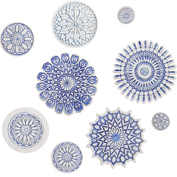 These circular handmade tiles make unique wall hangings for kitchens, bathrooms or outdoor wall art. Our blue and white decorative tiles can also be combined with our other circular tiles to make larger wall art installations.