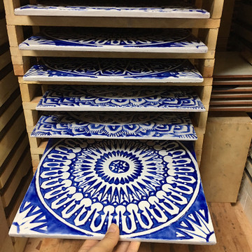 Blue and white handmade tile with relief. Decorative tile handmade in Spain.