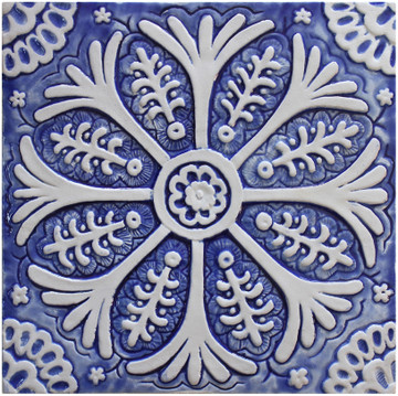 Blue and white handmade tile with relief. Decorative tile handmade in Spain.