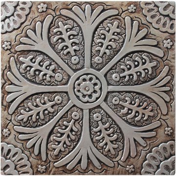 These handmade tiles make wonderful wall hangings and outdoor wall art.  Silver decorative tile handmade in Spain.