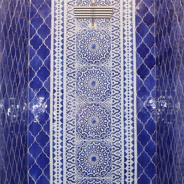 Luxury bathroom with blue and white handmade tile with relief. Decorative tile handmade in Spain.