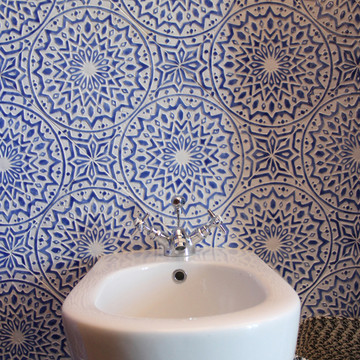 Luxury bathroom with blue and white handmade tile with relief. Decorative tile handmade in Spain.