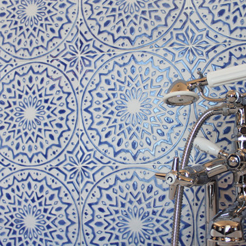 Luxury bathroom with blue and white handmade tile with relief. Decorative tile handmade in Spain.