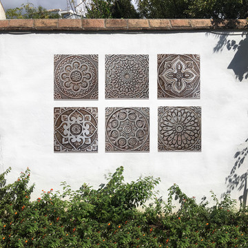 These handmade tiles make wonderful wall decor and outdoor wall art.  Silver tile handmade in Spain.