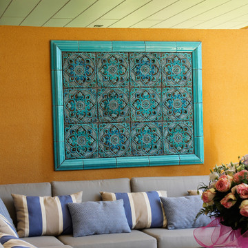 Outdoor wall art. Turquoise handmade tile with decorative relief. Large decorative tile with mandala design.