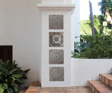 These handmade tiles make wonderful wall decor and outdoor wall art.  Silver tile handmade in Spain.