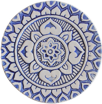 These circular handmade tiles make unique wall hangings for kitchens, bathrooms or outdoor wall art. Our blue and white decorative tiles can also be combined with our other circular tiles to make larger wall art installations.