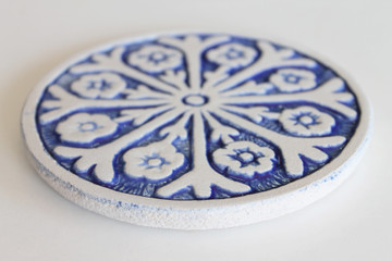 These circular tiles make beautiful outdoor wall art.  Blue and white wall hangings for kitchens, bathrooms and wall decor. Our decorative tiles can also be combined with our other handmade tiles to make larger wall art installations.