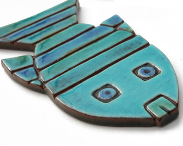 Turquoise handmade tile ceramic fish wall art installation. Handmade in Spain.