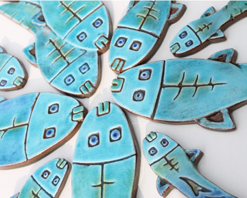 Fish ceramic wall art for kitchens, bathrooms and outdoor wall decor. Our handmade tiles make a beautiful wall art for your home or garden.