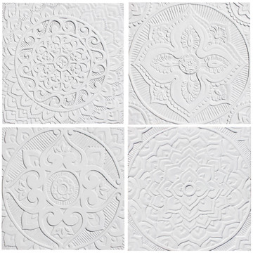 These handmade tiles are for kitchens and bathrooms.  These decorative tiles also make wonderful wall hangings and outdoor wall art.  Our white relief tiles are handmade in Spain.