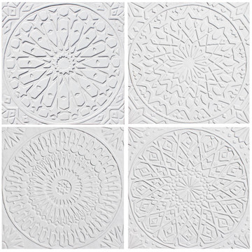 These handmade tiles are for kitchens and bathrooms.  These decorative tiles also make wonderful wall hangings and outdoor wall art.  Our white relief tiles are handmade in Spain.