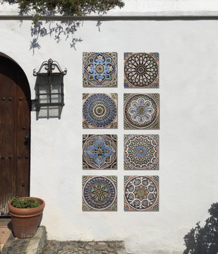 These handmade tiles make outdoor wall art.  Decorative tile handmade in Spain.