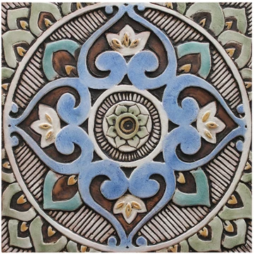 These handmade tiles make outdoor wall art.  Decorative tile handmade in Spain.