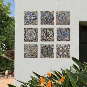 These handmade tiles make outdoor wall art.  Decorative tile handmade in Spain.