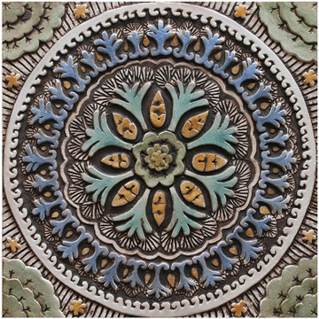 These handmade tiles make outdoor wall art.  Decorative tile handmade in Spain.