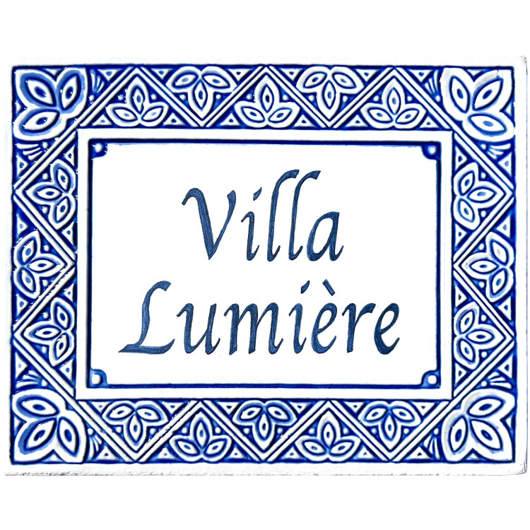 Blue and white house sign made from ceramic with petals design.