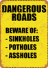 Dangerous Roads. Beware of Sinkholes, Potholes and Assholes - Metal Sign