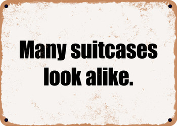 Many suitcases look alike. - Funny Metal Sign