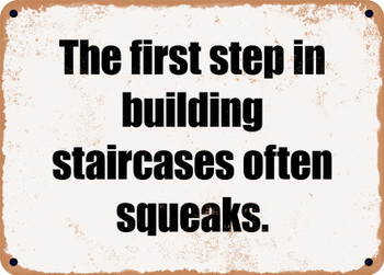 The first step in building staircases often squeaks. - Funny Metal Sign
