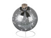 outdoor holiday yard display with large silver ornament decoration