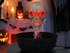 bleeding skull fountain halloween decoration with flowing blood effect