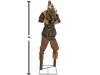 tall scarecrow halloween decoration with tattered clothing and straw detail