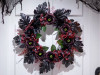 dark floral halloween wreath with hidden eyes