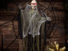 animated skeleton hanging in spider web