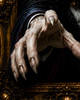 Dracula reaching toward viewer from haunted frame
