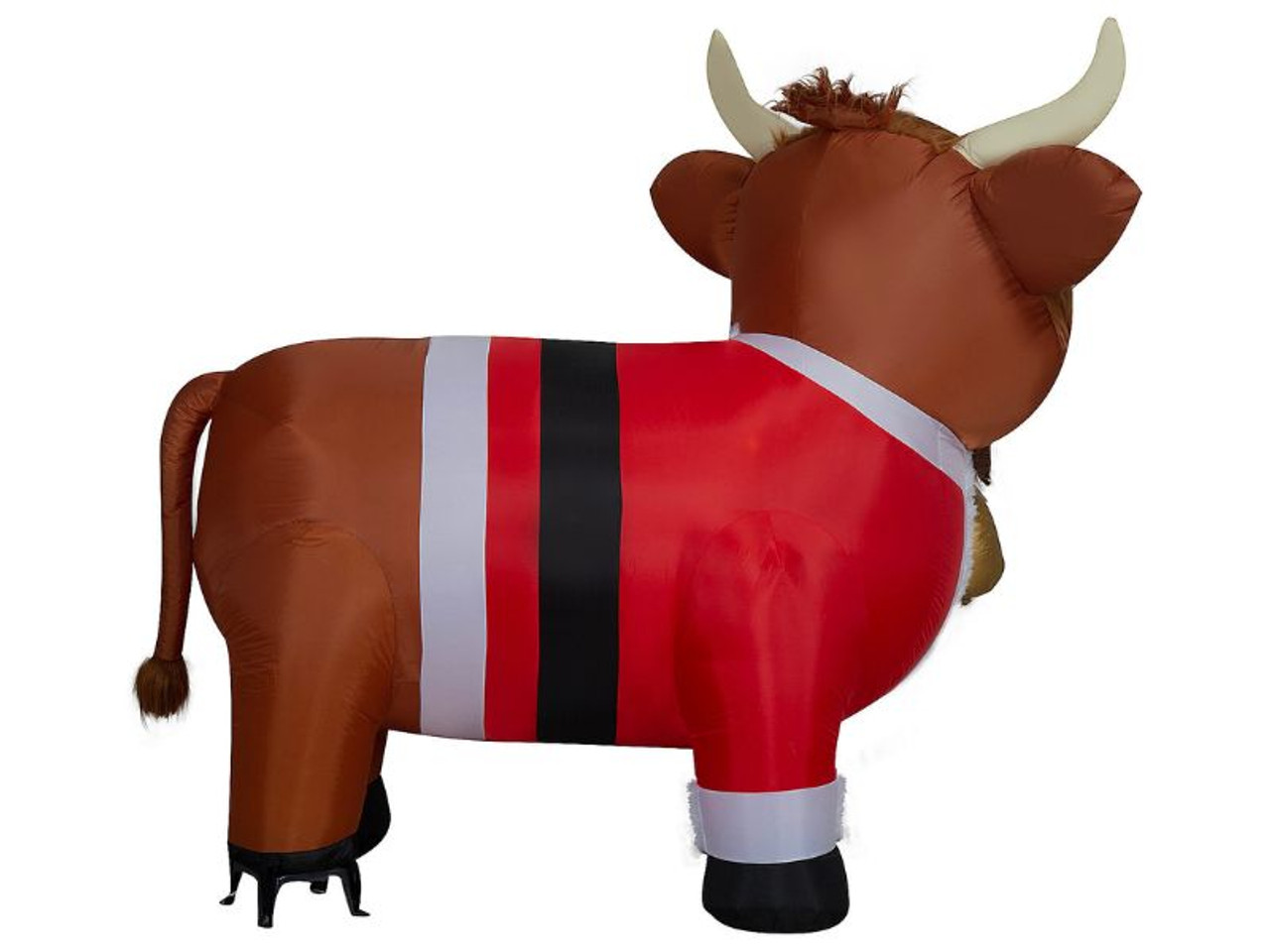 close-up of plush fur and gold cowbell on inflatable Christmas cow close-up of plush fur and gold cowbell on inflatable Christmas cow