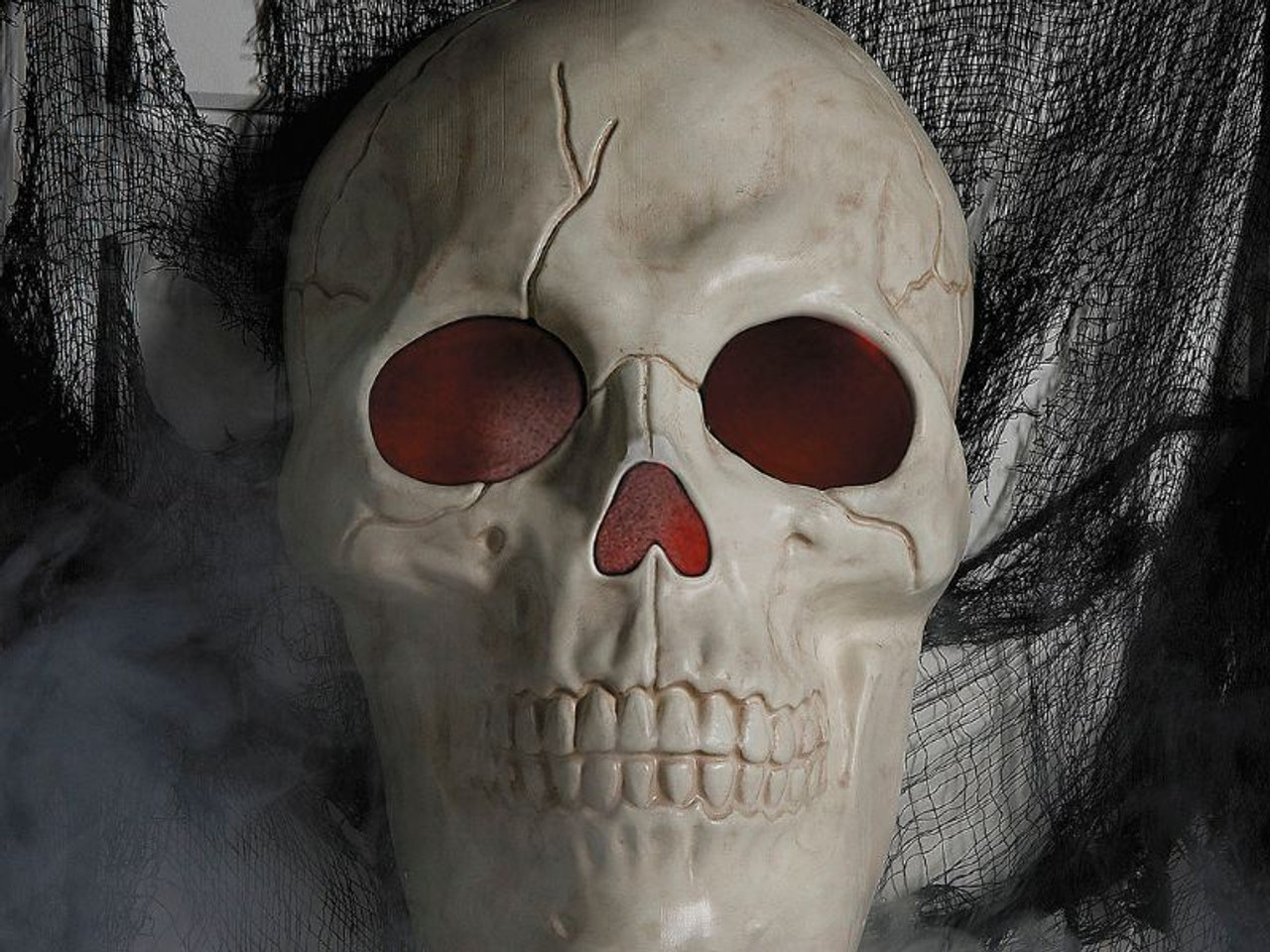 close-up of large 19-inch Halloween skull prop with eerie features