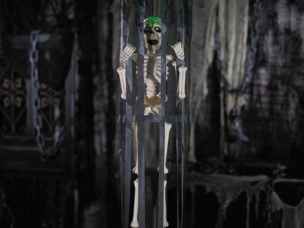 Animated Light-Up Skeleton in a Shaking Cage