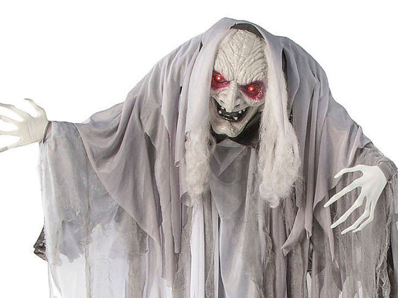 close-up of wrinkled skull face and long gray hair