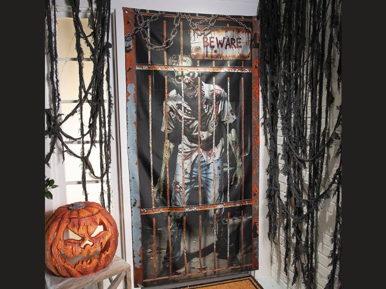 zombie in cage door curtain hanging in doorway