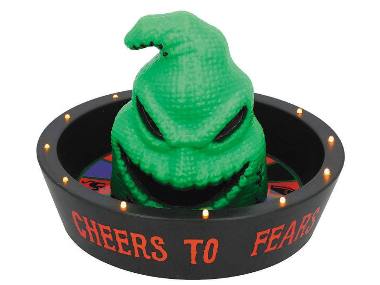 Sinister Oogie Boogie face peeking over candy bowl with glowing edge