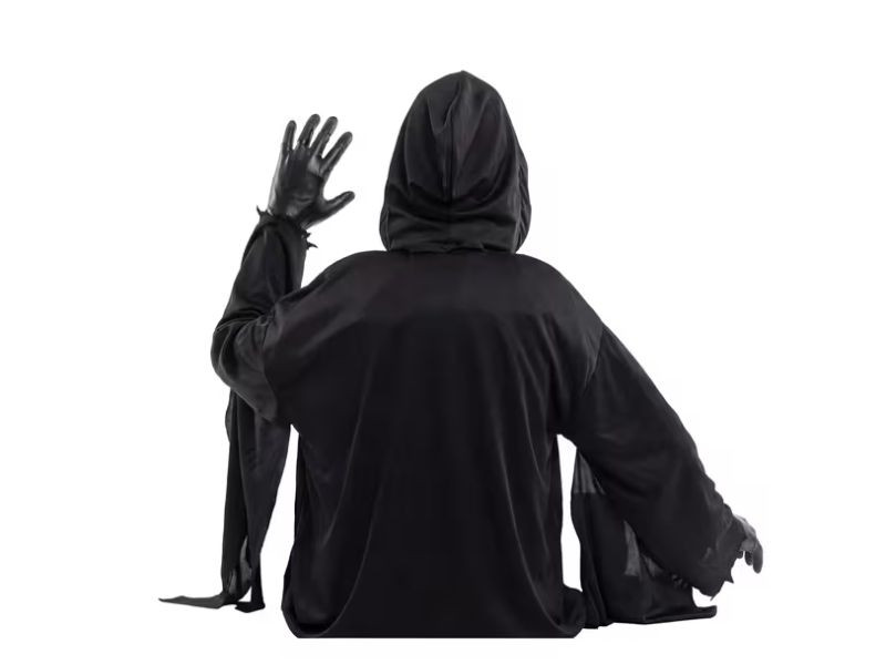 horror yard decoration ghost face emerging from ground