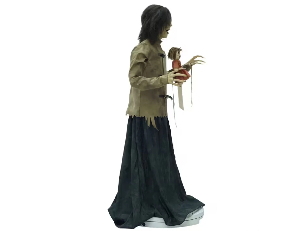 creepy asylum patient halloween prop with doll